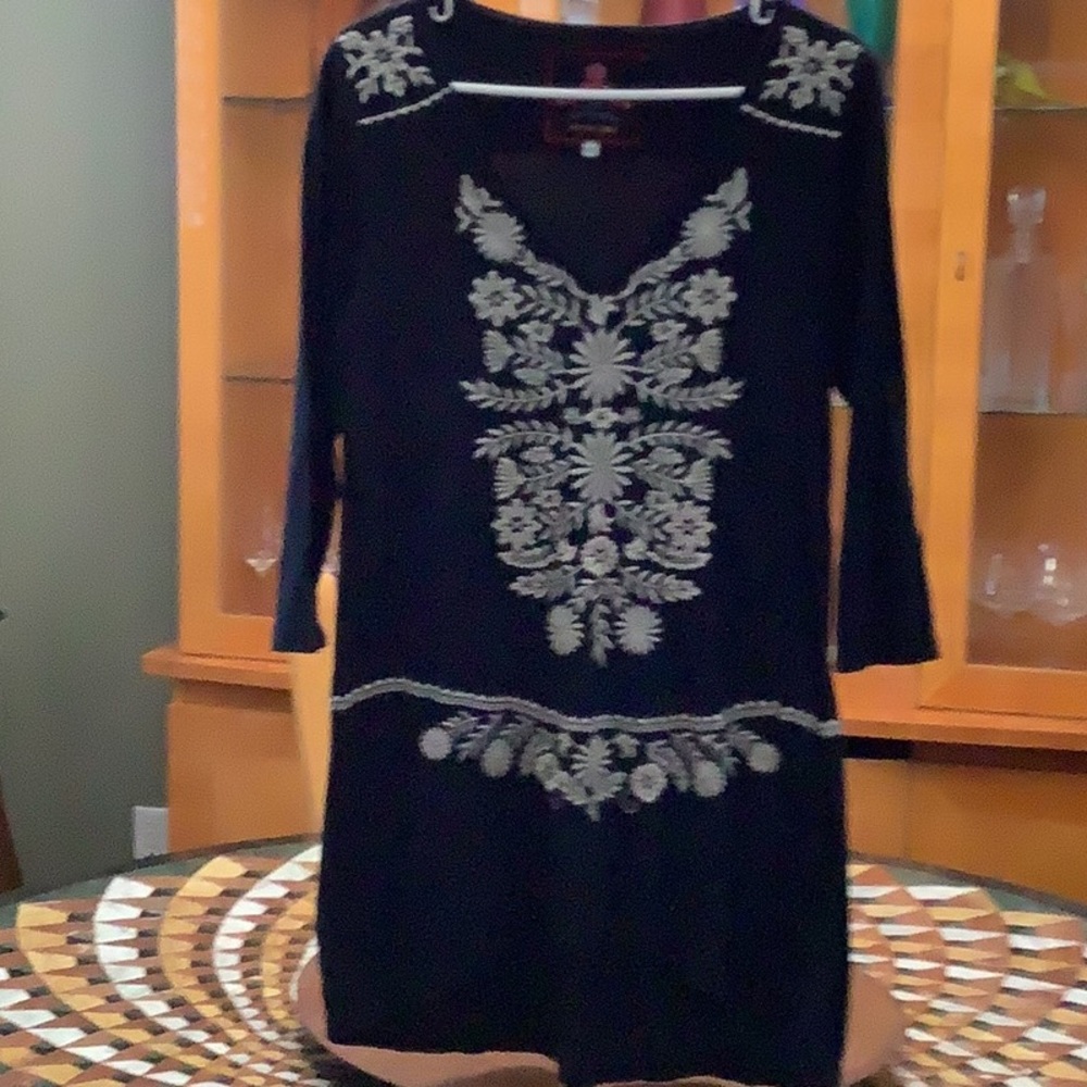 Johnny was beautiful embroidery looks great with leggings or over swim wear.